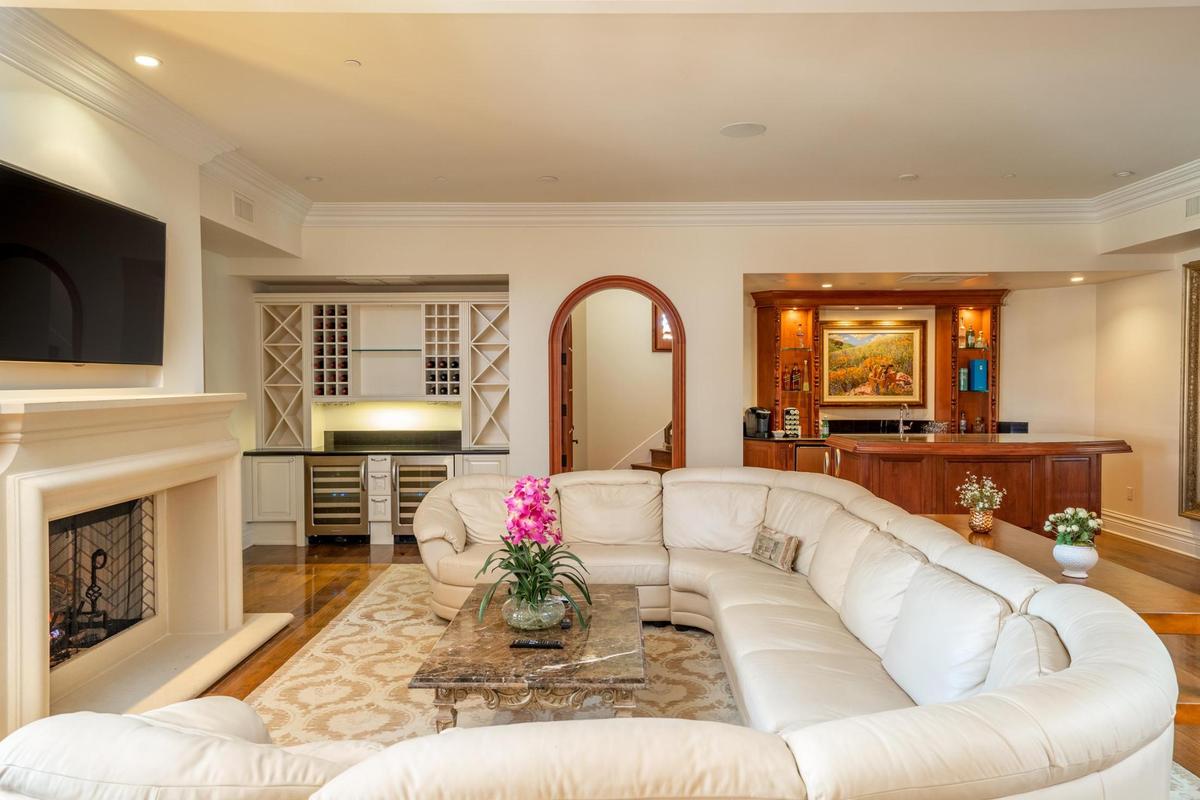 The living room of one of the two 3,700-square-foot villas at Villa San-Juliette. The property owned by “American Idol” producers Ken Warwick and Nigel Lythgoe will go up for auction on May 17, 2025.