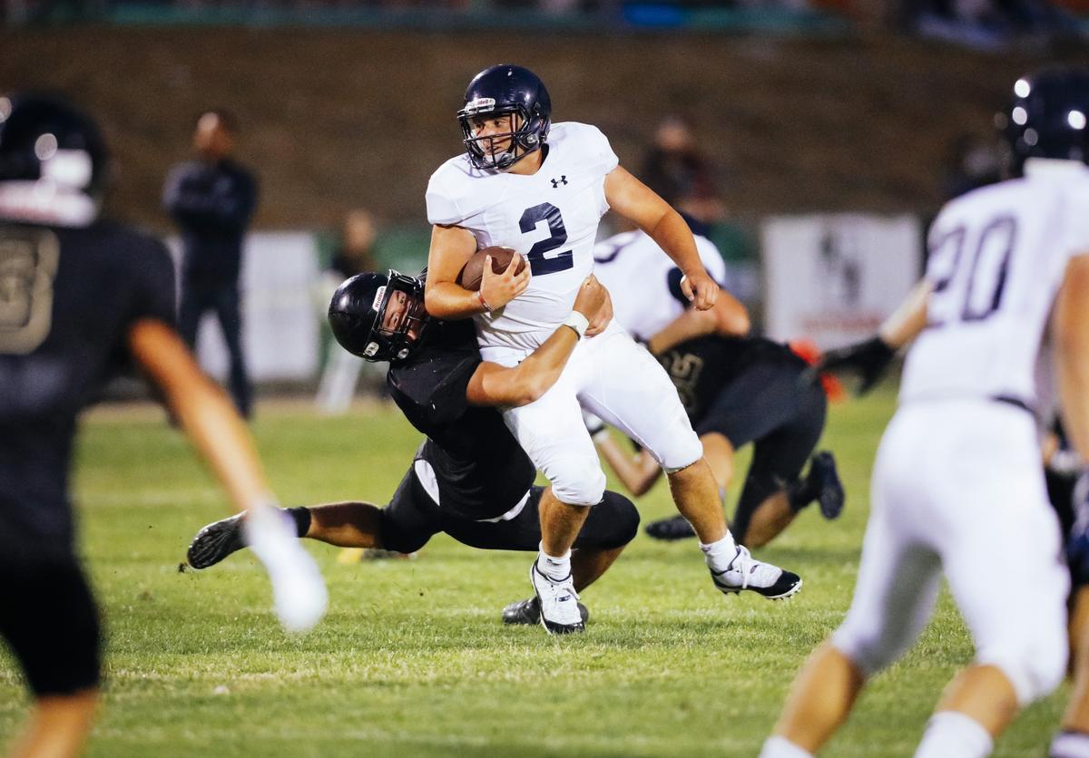 Arroyo Grande High School’s Kadin Byrne carries the ball in Friday’s non-conference game against San Luis Obispo.