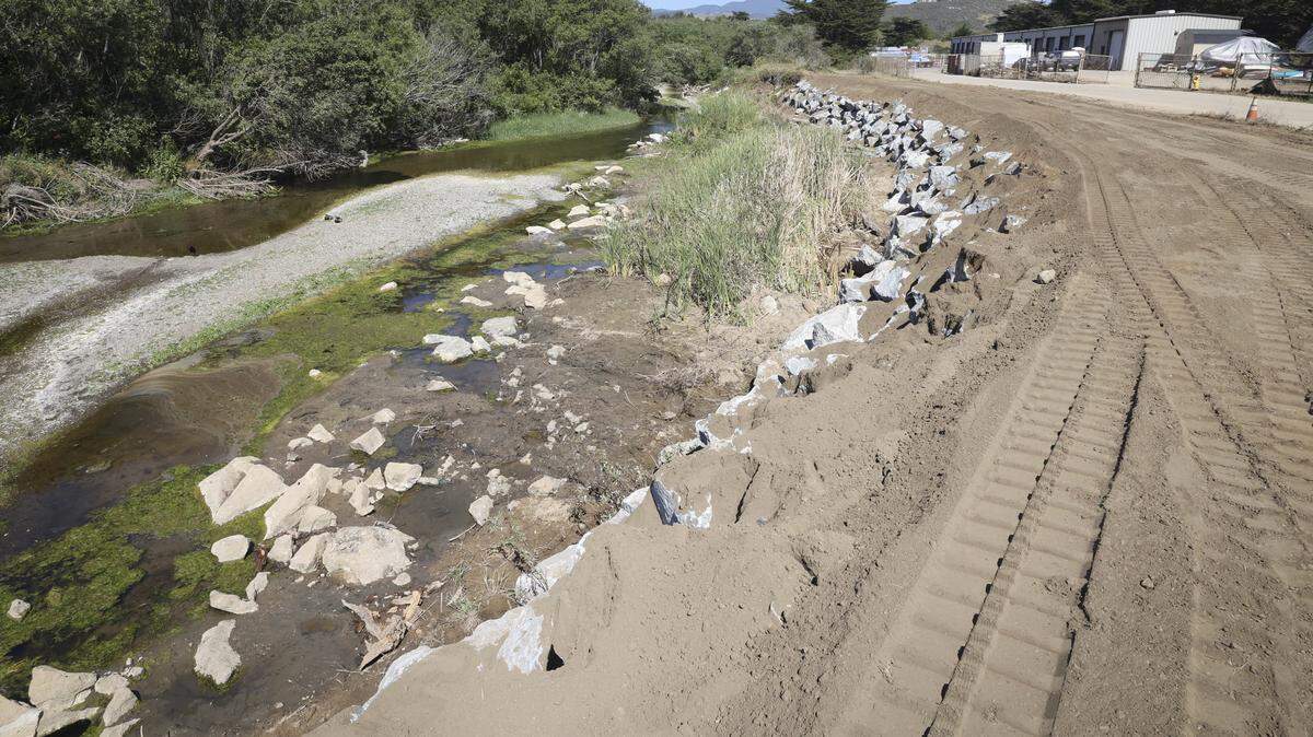 Work is being completed to repair 2023 erosion to Morro Creek on April 7, 2026.