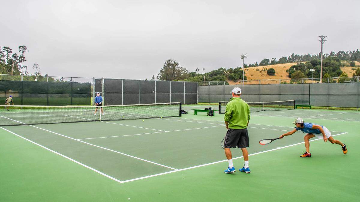 Cambria Tennis Club players enjoyed the newly resurfaced Court No. 3 on Thursday, June 25. In the foreground are Barrett Stuart and Debbie Markham; behind the net is CTC president Mark Berry, right, and Daniel Grant.