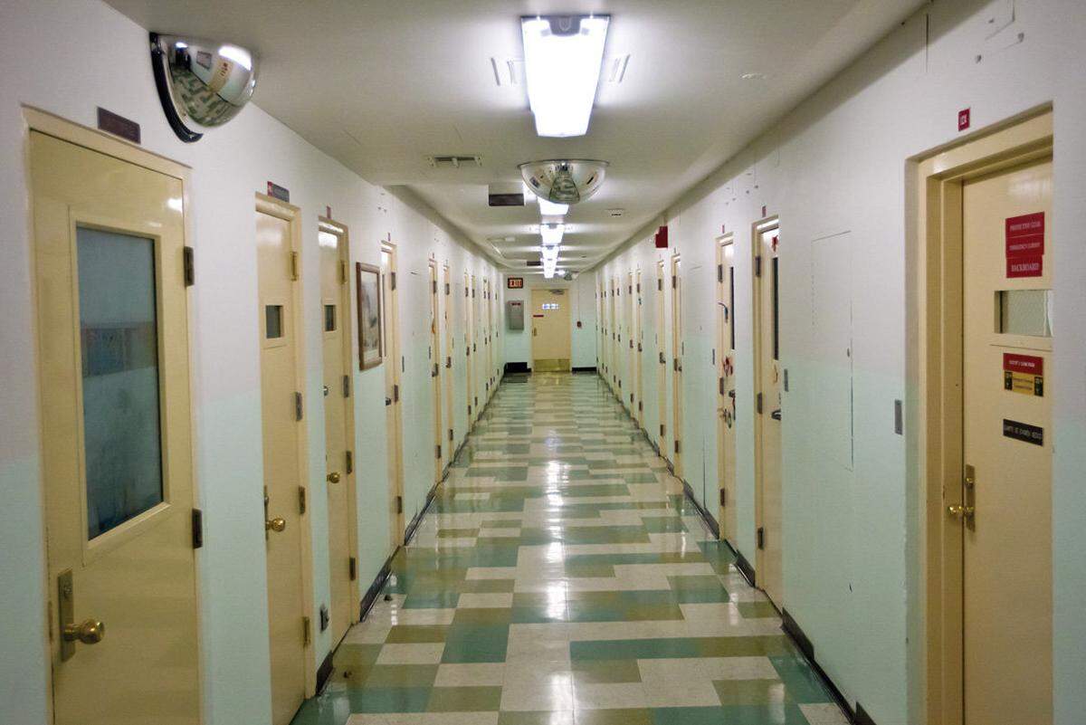 An empty hall in a ward at Atascadero State Hospital. Patients are being confined to their rooms as a precaution against coronavirus.