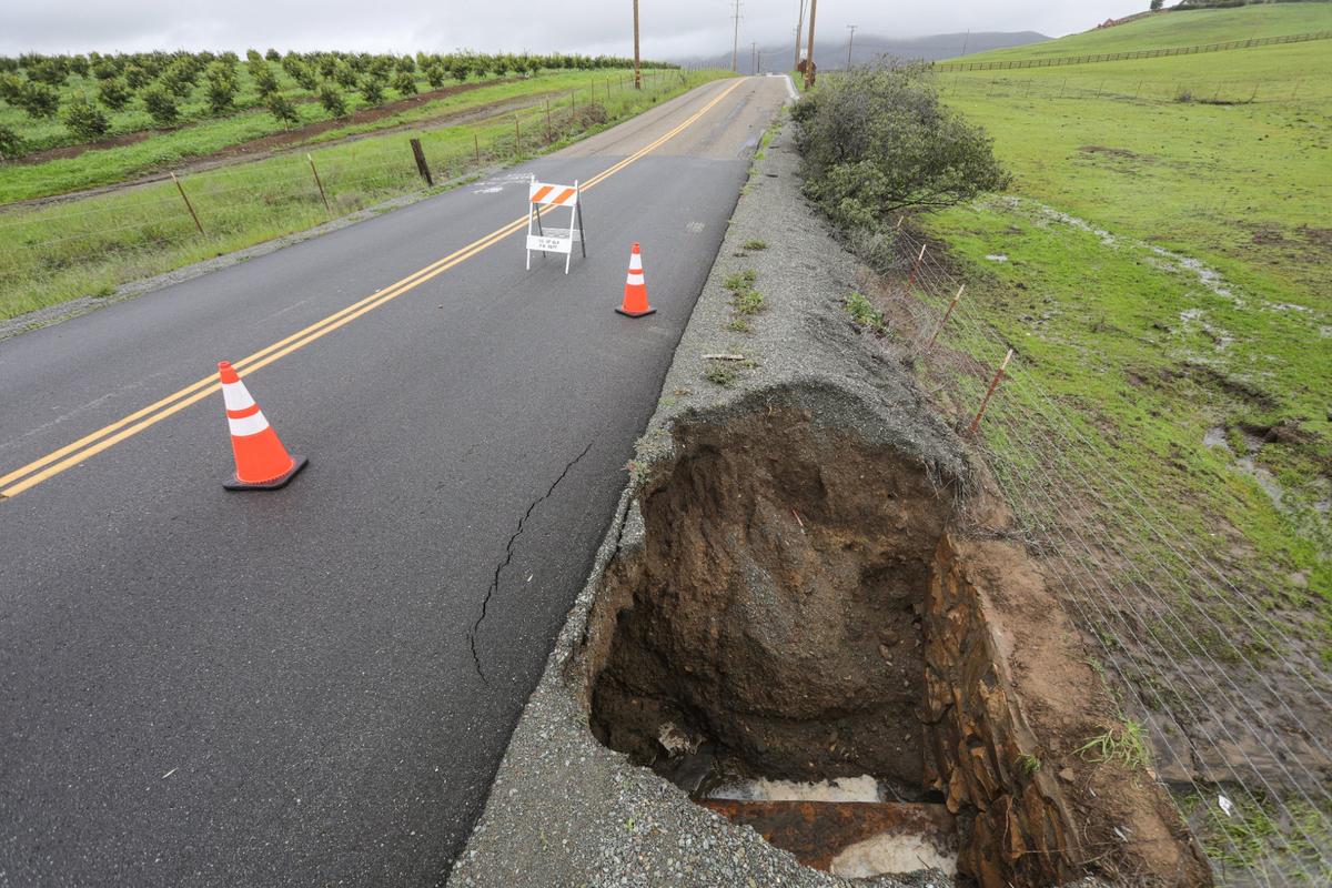 Orcutt Road was closed in both directions a mile north of Righetti Road on Sunday, Jan 15, 2023, due to heavy storm runoff that undermined the road at a 1930s-era Works Progress Administration culvert.