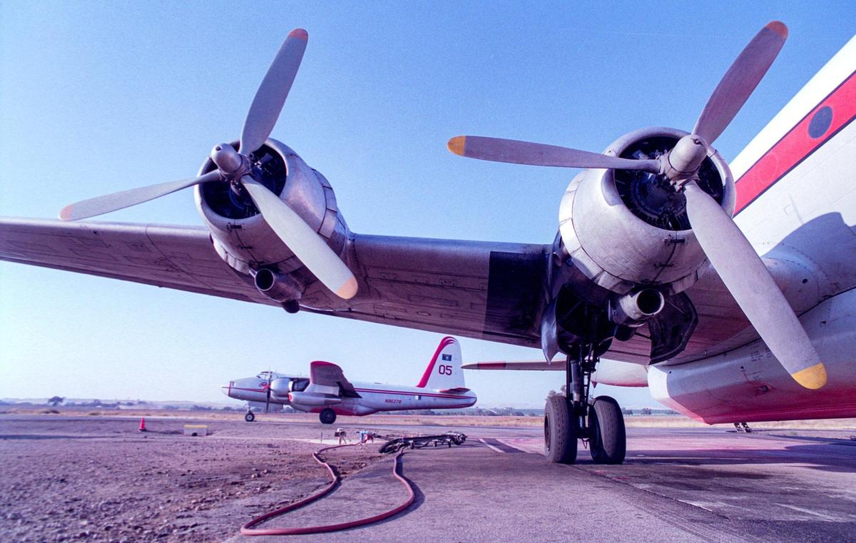 Air tankers from the California Department of Forestry (the predecessor to Calfire) take a break at Paso Robles Airport from fighting fires near Big Sur Sept 17, 1999.