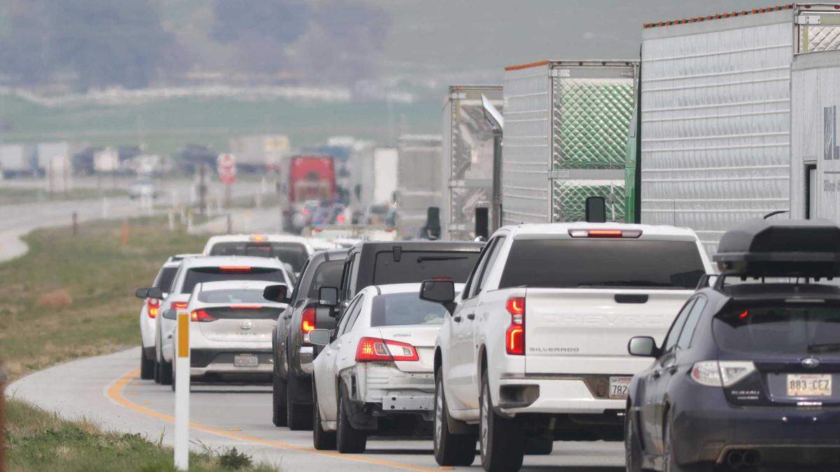 Traffic is stopped on Highway 46 east of Shandon on Jan. 31, 2022, after one person was killed and three others were injured in a four-vehicle car crash.