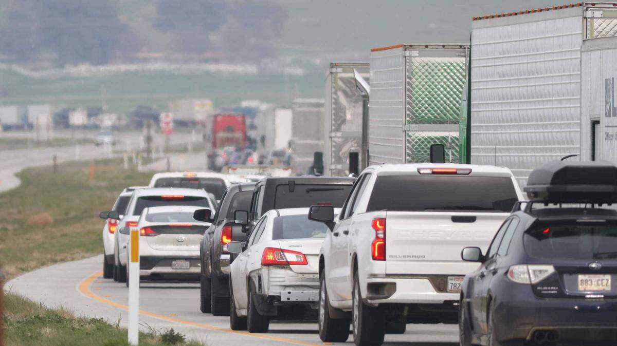 Traffic is stopped on Highway 46 east of Shandon on Jan. 31, 2022, after one person was killed and three others were injured in a four-vehicle car crash.