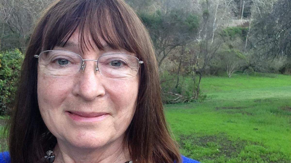 Connie Gannon, in front of the Greenspace Creekside Preserve.
