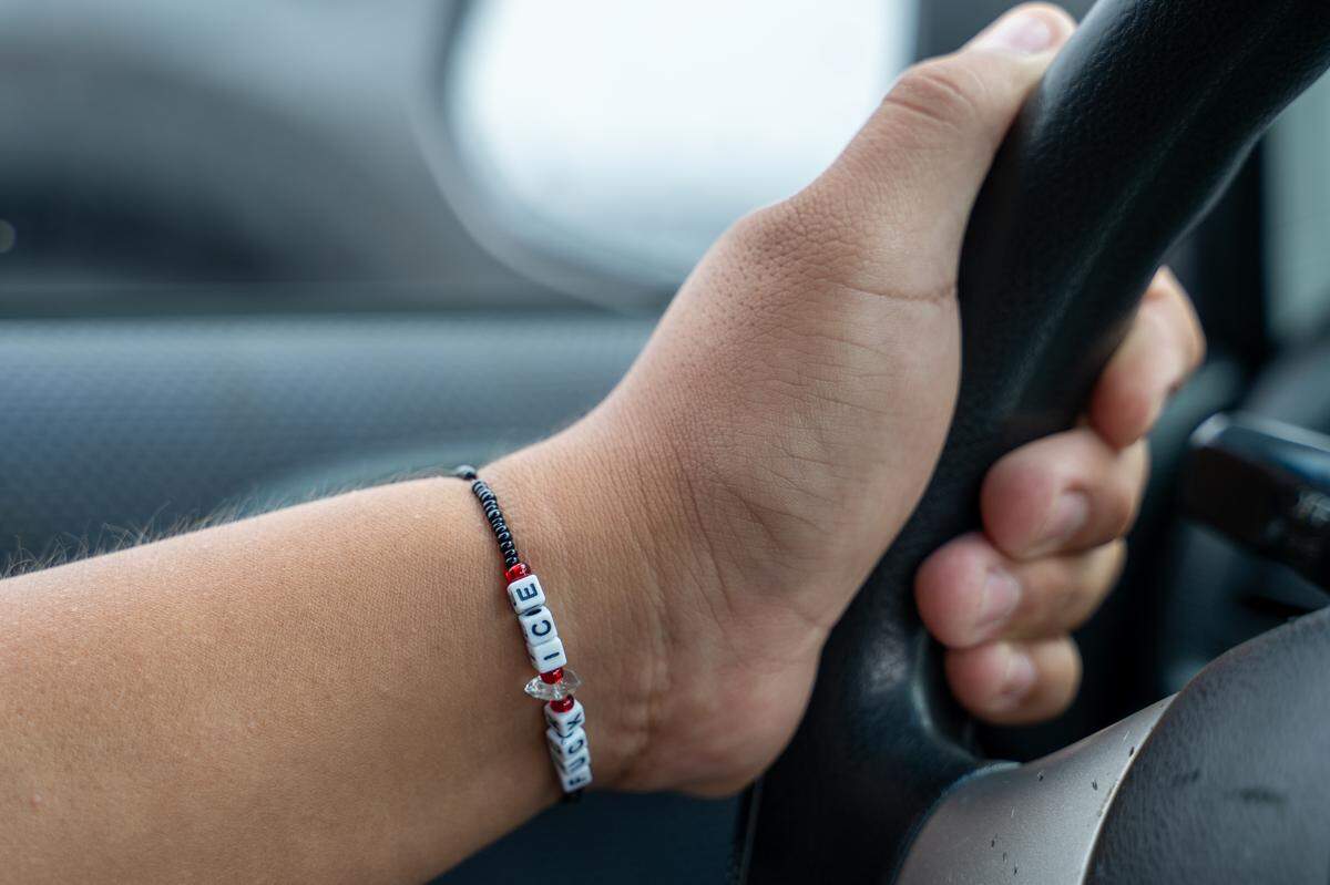 Cesar Vasquez wears a bracelet with an anti-ICE message while patrolling for ICE in Santa Maria on Sept. 20, 2025.