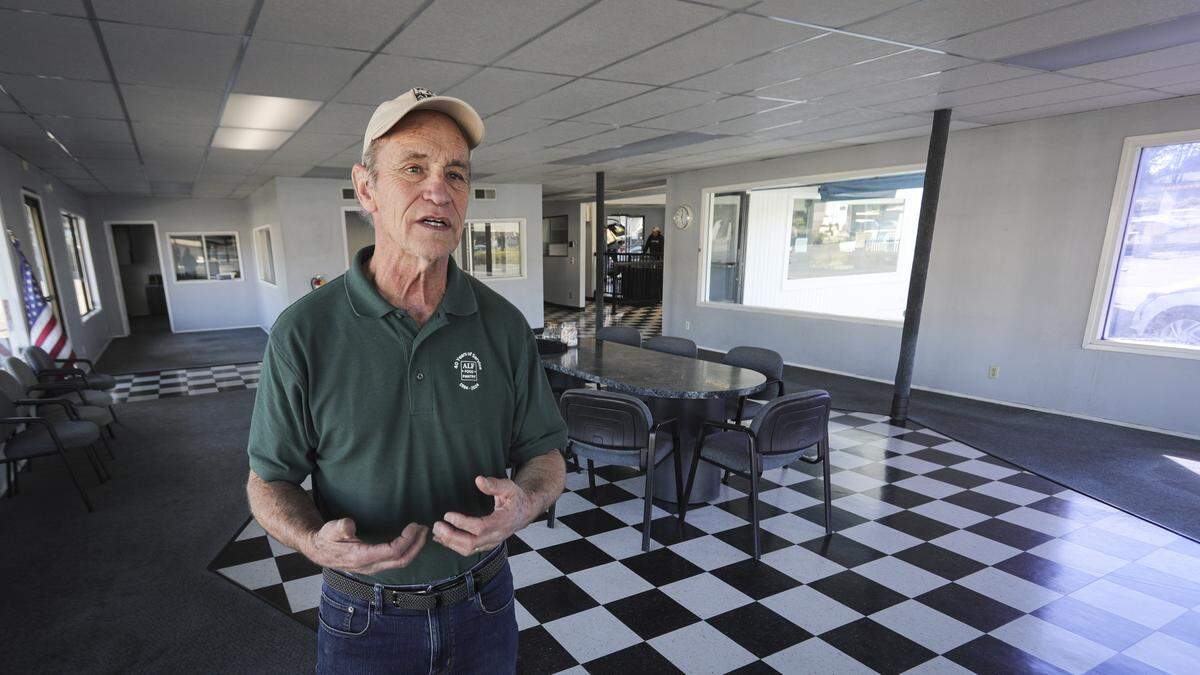 ALF Food Pantry board president Tim Eckles stood in the former Ted Miles Motors dealership on Feb. 4, 2026. The nonprofit plans to move into the building this summer.