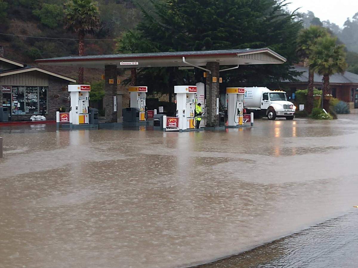 The parking lot of the Shell gas station in Cambria is flooded on Thursday, Jan. 28, 2021.