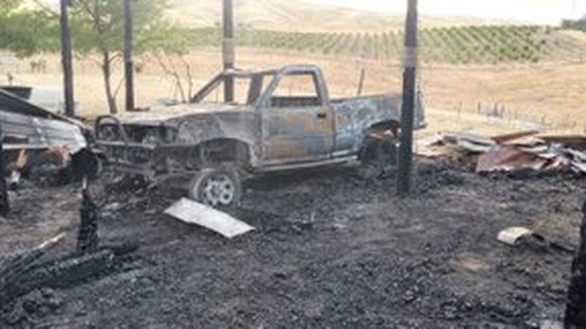 Firefighters from Cal Fire, Paso Robles Fire and Emergency Services and the Atascadero Fire Department responded to a fire that destroyed a barn in rural Paso Robles in the early morning of Wednesday, July 24, 2024.