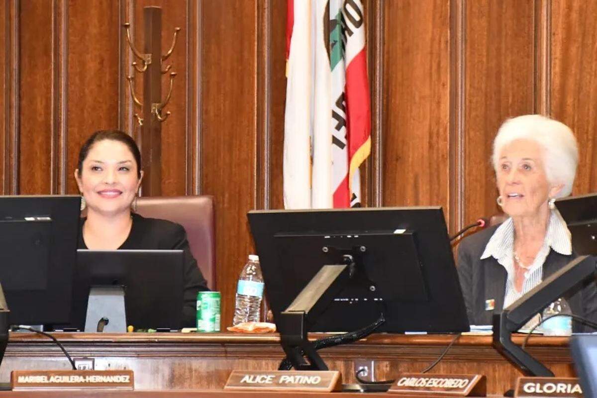 Santa Maria Councilwoman Maribel Aguilera-Hernandez, left, and Mayor Alice Patino listen during Tuesday’s meeting to a report on the city’s issues related to homelessness, including encampments within the riverbed, which actually falls under San Luis Obispo County’s jurisdiction.
