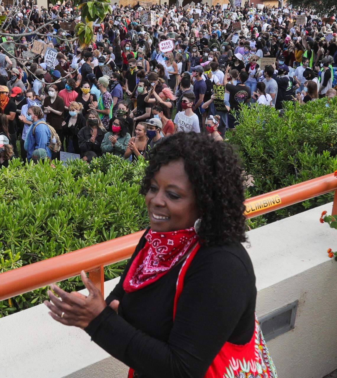 Cheryl Vines from the NAACP dances with the crowd at courthouse during a June 4 rally in San Luis Obispo.