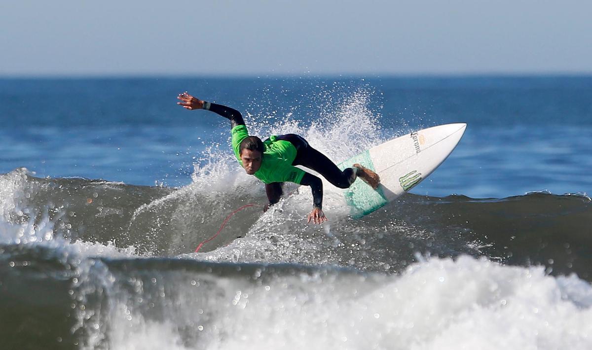 Jhony Corzo of Mexico competes the heat 2 of the qualifying round Friday.