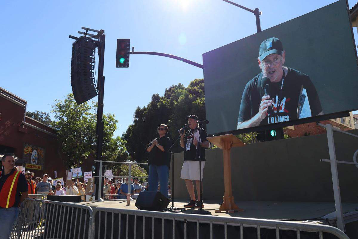 Thousands of people attended the No Kings rally in downtown San Luis Obispo to protest the Trump administration and support Prop. 50 on Oct. 18, 2025. Speeches kicked off shortly after 11 a.m. from a stage set up at Osos and Monterey streets.