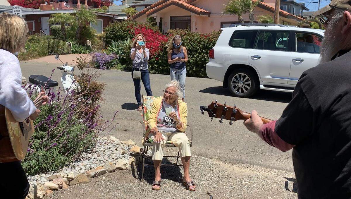 Donna Shook, 90, was serenaded in her front yard for a socially distant party.