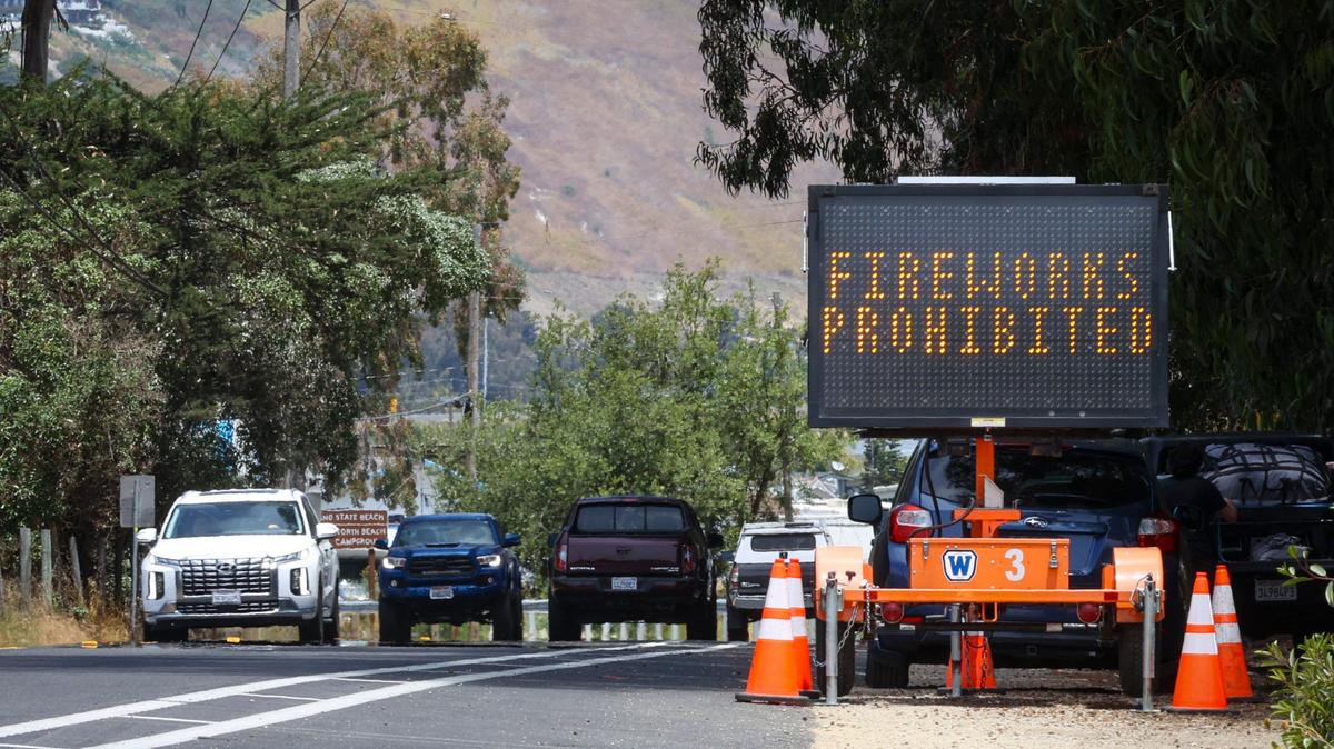A light-up road sign along Highway 1 at the Pismo Beach city limits announces that fireworks are prohibited.