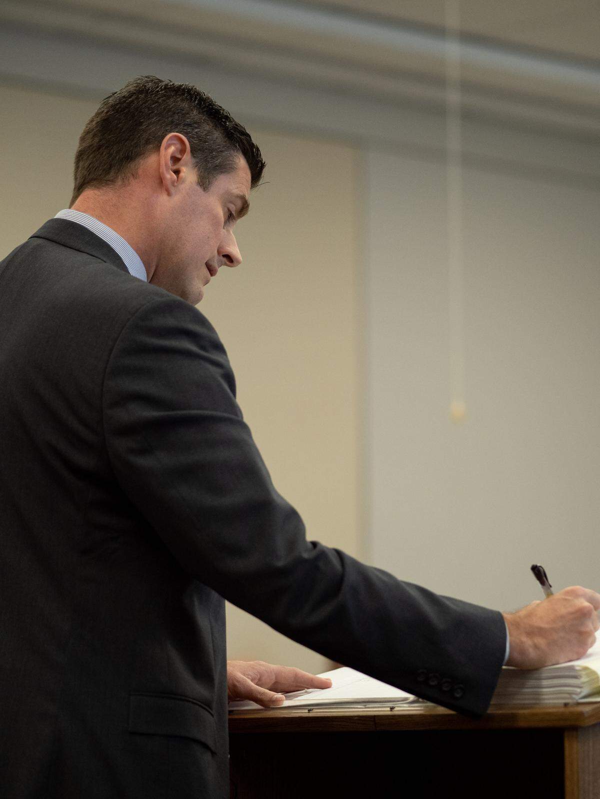 Deputy District Attorney Chris Peuvrelle takes notes during the Kristin Smart murder trial on Thursday, Sept. 22, 2022, at the Monterey County Courthouse in Salinas.