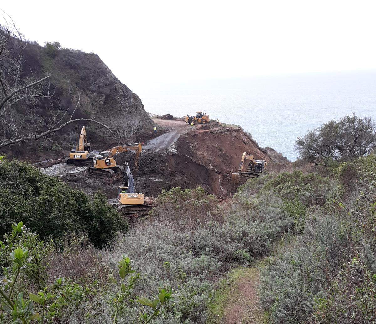 Earth-moving equipment scrapes and relocates soggy soil, rocks and more in the project to reopen Highway 1 30 miles north of the San Luis Obispo County line. Dave Nelson, who lives on the north side of the Big Sur slide area, captured this image of the work in progress.