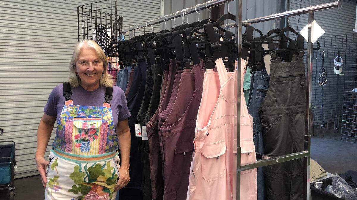 Rosies Workwear owner Sharon Moore poses for a picture at her company’s warehouse in San Luis Obispo. The company is moving to Kansas. 
