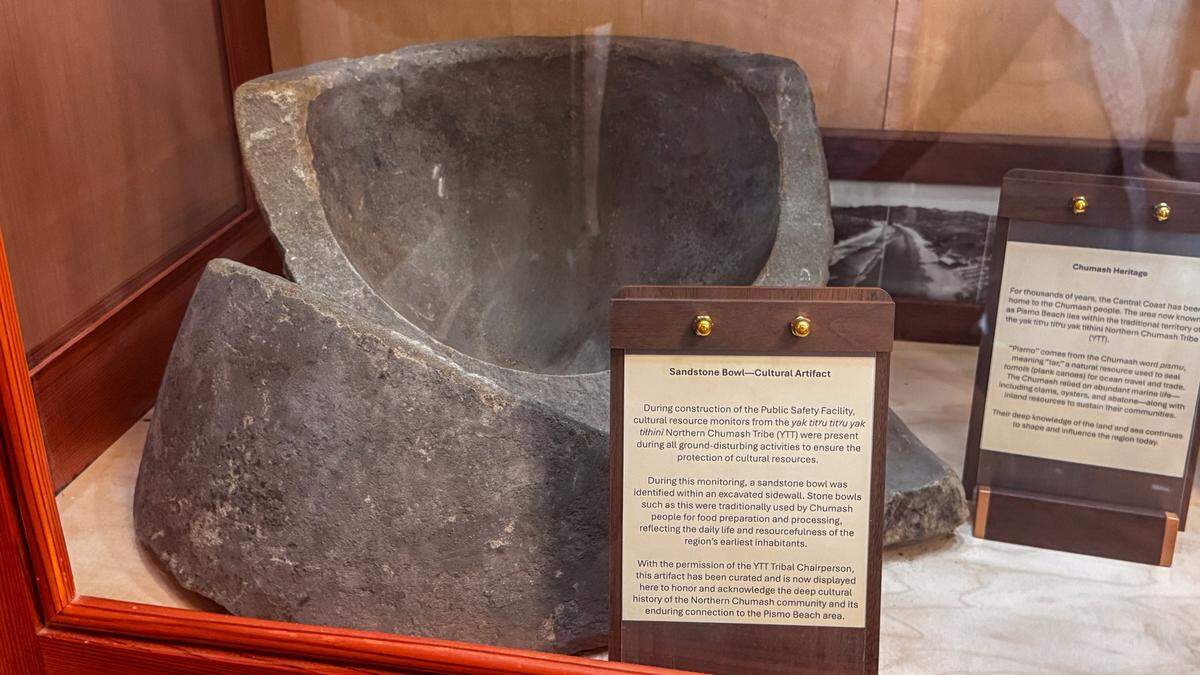 A sandstone bowl uncovered in the construction of Pismo Beach's new Public Safety Center and loaned to the city by the yak titʸu titʸu yak tiłhini Northern Chumash Tribe for display sits in the lobby of the new facility on Monday, May 11, 2026. The facility cost around $51 million.