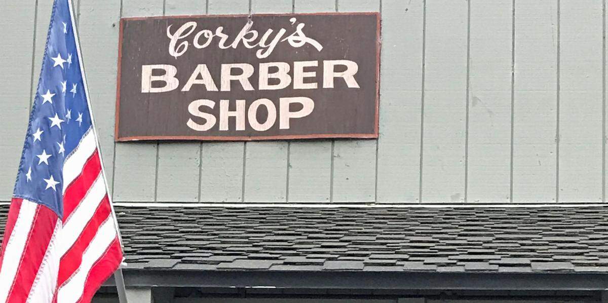 This low-key sign is high above the door to Corky’s Barber Shop in Cambria, where owner Courtney “Corky” Miles has been providing cuts and trims since 1972.