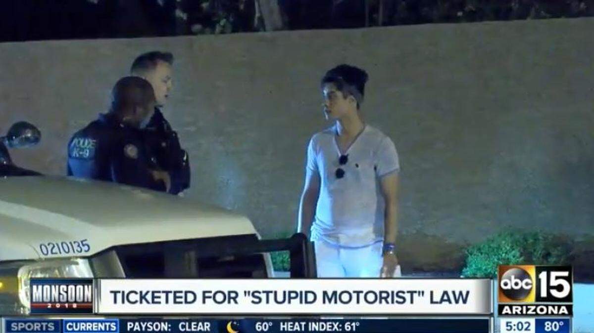 Cooper Moore, 20, was given four citations, including one under Arizona’s “Stupid Motorist Law” after he drove through barricades and got stuck in rushing water during a monsoon.