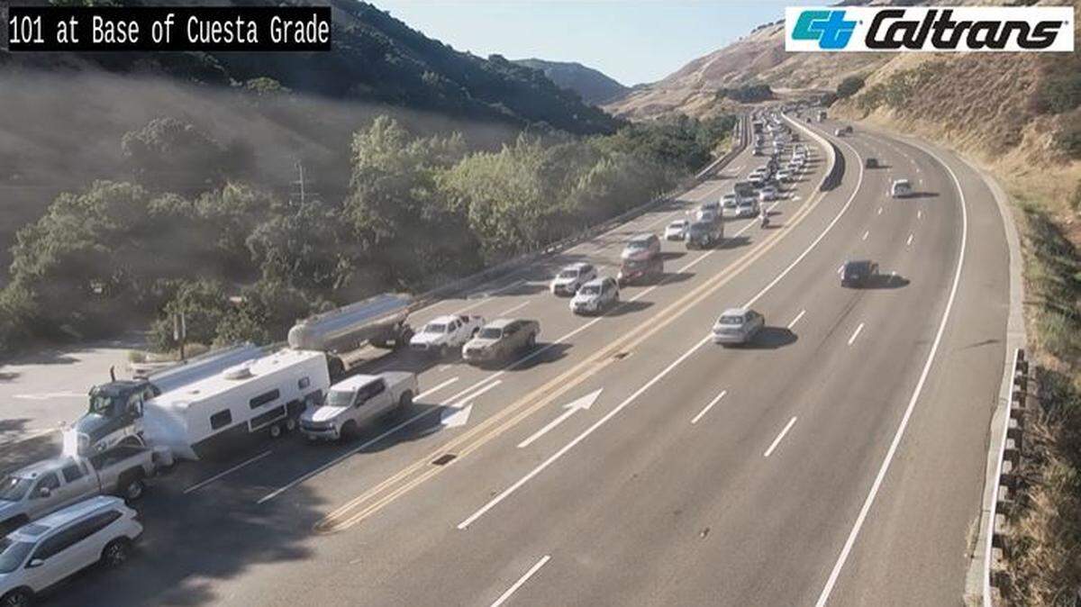 An overturned bus at the base of the Grade on Highway 101 snarled traffic through San Luis Obispo on Thursday evening.
