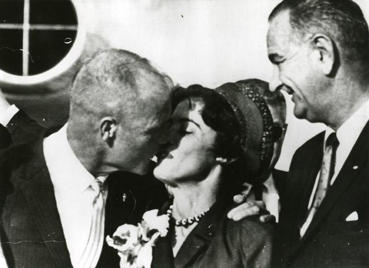 John Glenn greets his wife, Annie Glenn, as Vice President Lyndon B. Johnson looks on during the reunion of the Glenn family at Patrick Air Force Base in Florida after Glenn’s Friendship 7 space flight on February 23, 1962.