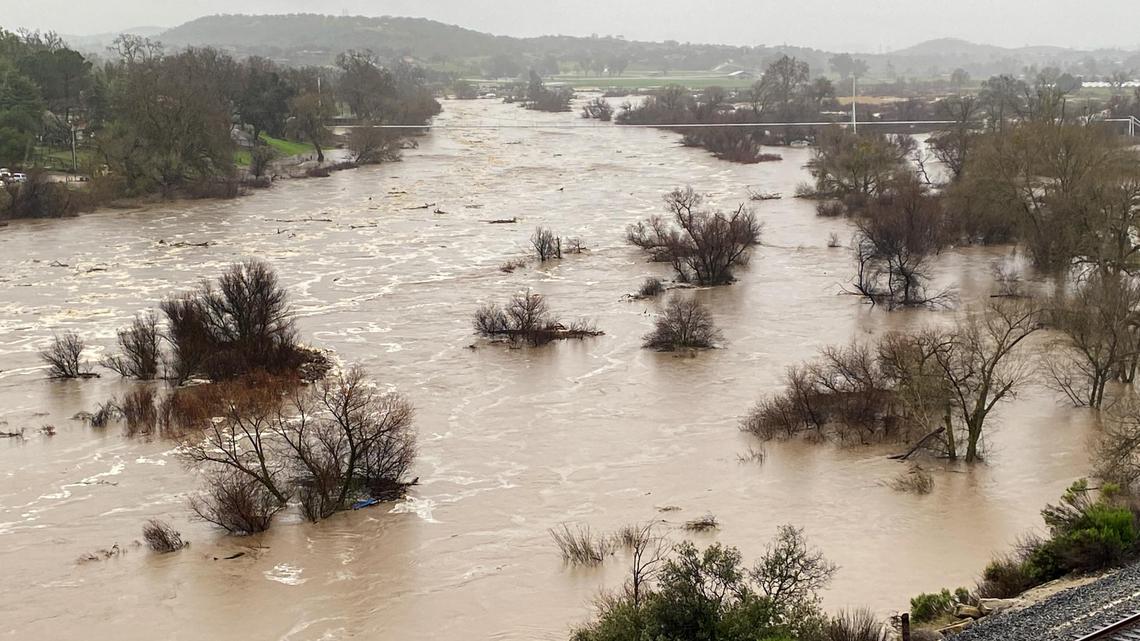 Video: See the Salinas River flow 2 feet above flood stage through Paso Robles