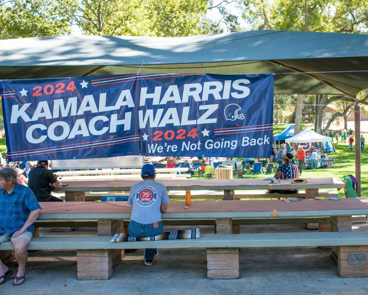 A Kamala-Walz banner hangs at the San Luis Obispo County Democratic Party’s Labor Day BBQ.