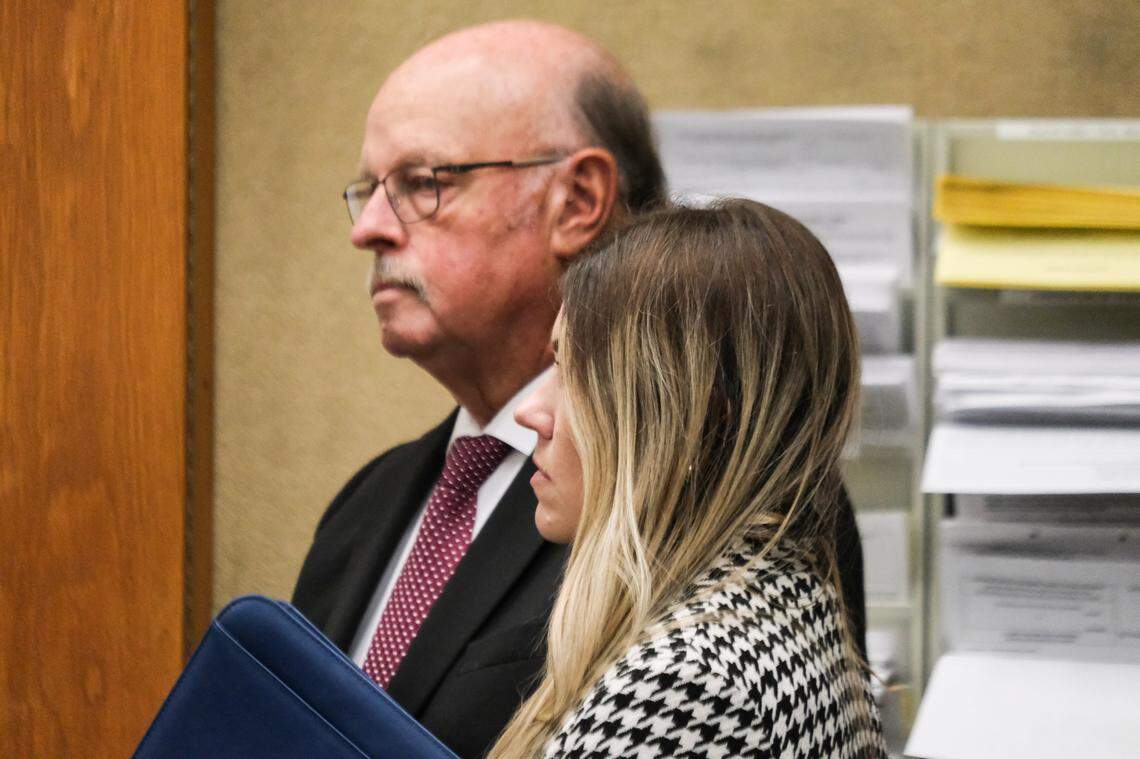 Defense Attorney Robert Sanger, left, and Deputy Probation Officer Fallyn Rollins listens in court, where she faced charges for embezzling more than $100,000 from the agency’s union, on Feb. 7, 2025.