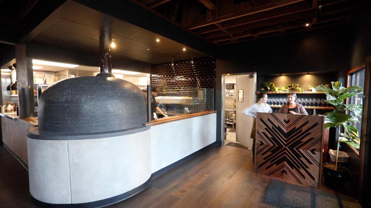 A wood-fired pizza oven is the centerpiece as you walk into Bear & The Wren. The pizza restaurant is located in the old Spike’s building on HIguera Street in San Luis Obispo.
