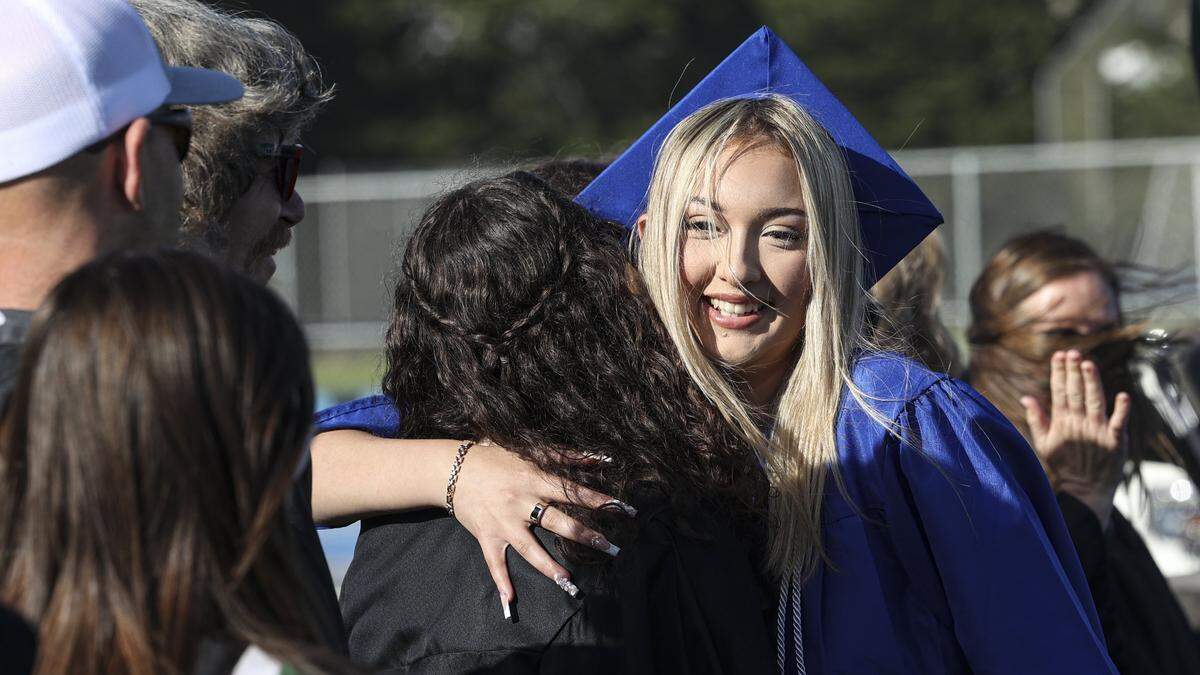 Vanessa Acuna was the first to get a diploma and hugs from faculty. Morro Bay High School issued diplomas to 176 graduates on June 4, 2026.