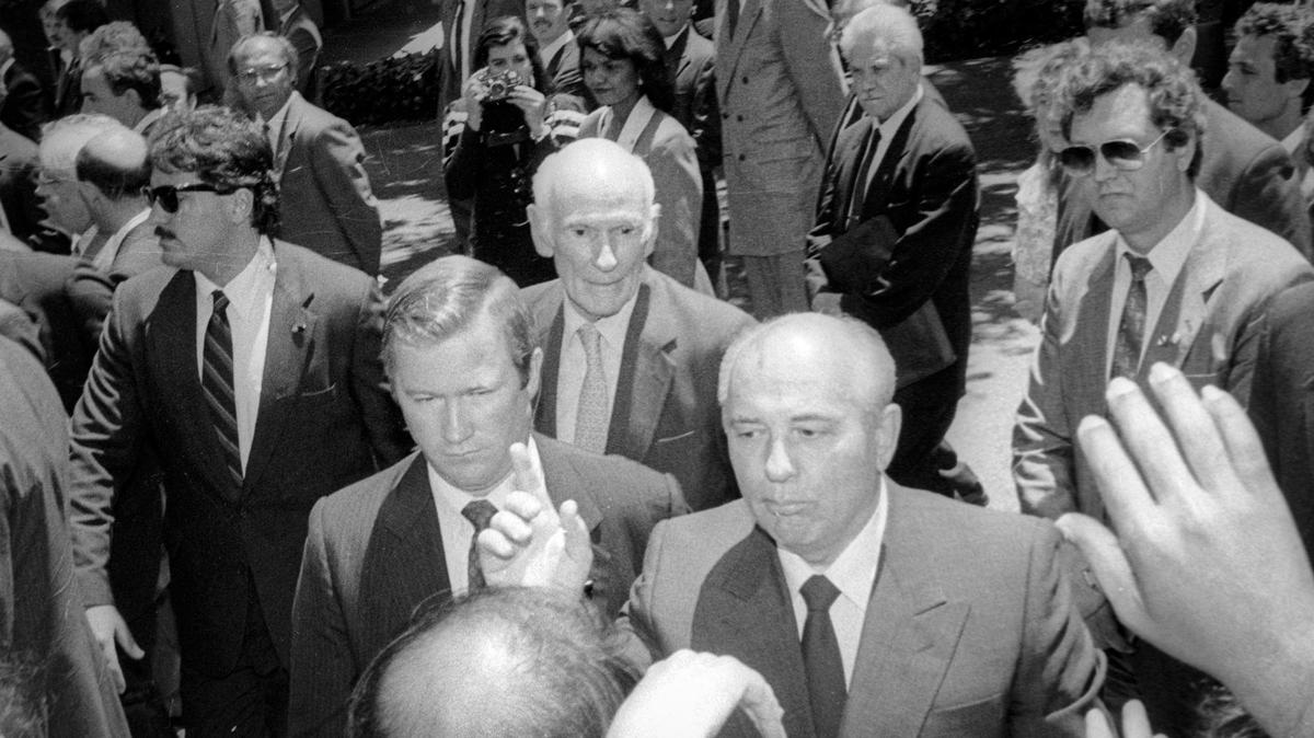 President of the Soviet Union, Mikhail Gorbachev at lower right visits Stanford University June 4, 1990. Behind and to the the left is California U.S. Senator Alan Cranston.