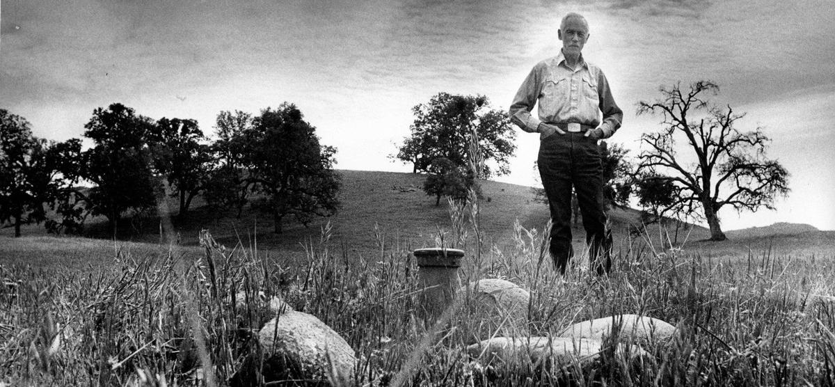 Pozo area rancher Jim Sinton stands by a bench marker from an original federal survey. This photo was originally published in April 1988 with a series of stories in the Telegram-Tribune on the Los Padres National Forest.