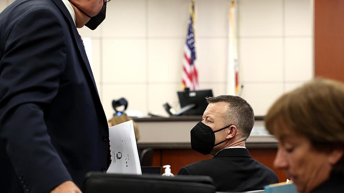 Paul Flores glances toward defense attorney Paul Sanger during the Kristin Smart murder trial in Salinas, on Monday, Sept. 12, 2022.