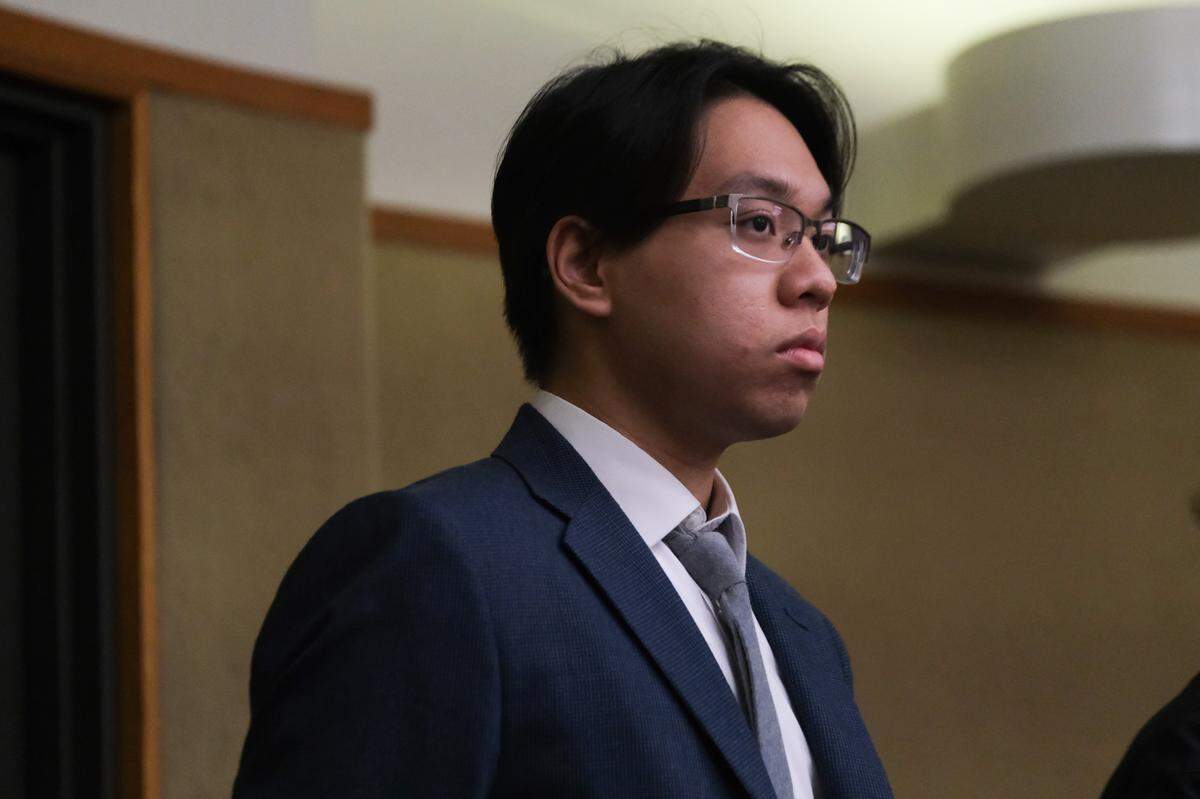 Cal Poly student Brandon Pham listens at a hearing in San Luis Obispo Superior Court on Dec. 20, 2023. Pham and Charles Hojaboom are accused of firing guns on campus multiple times.
