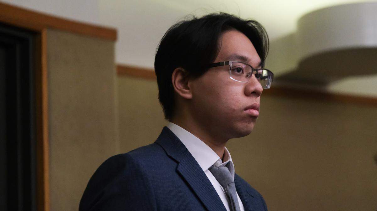 Cal Poly student Brandon Pham listens at a hearing in San Luis Obispo Superior Court on Dec. 20, 2023. Pham and Charles Hojaboom are accused of firing guns on campus multiple times.