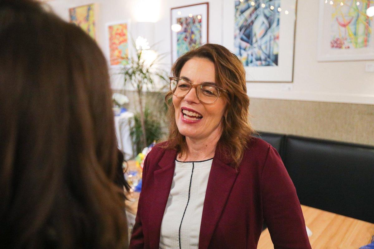 Dawn Addis talks to supporters at a party in San Luis Obispo election night Nov. 8, 2022.