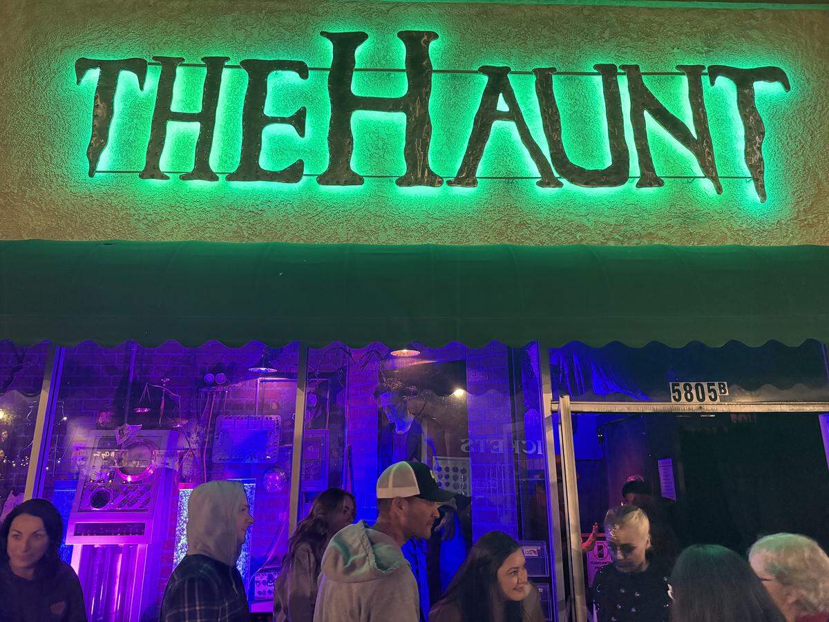 Visitors line up to enter The Haunt in Atascadero on Oct. 24, 2025.