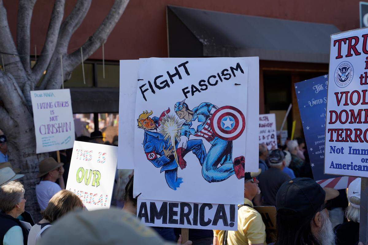 Residents across SLO County rallied downtown at the San Luis Obispo Superior Courthouse for a No Kings protest featuring speakers, music and community groups on March 28, 2026.
