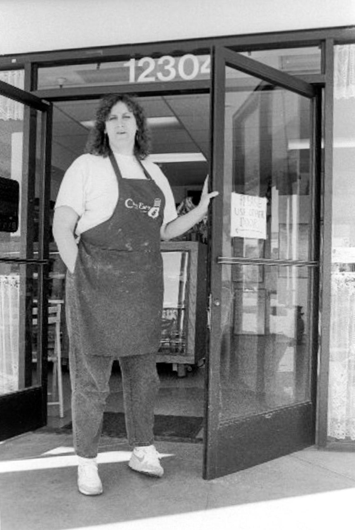 Chef Em Bashore can no longer open her door all the way because of the ground subsidence Jan. 17, 1991. Due to drought the city of San Luis Obispo was pumping water near Los Osos Valley Road as well as farmers. When the ground in the area sank damaging businesses and houses lawsuits were filed