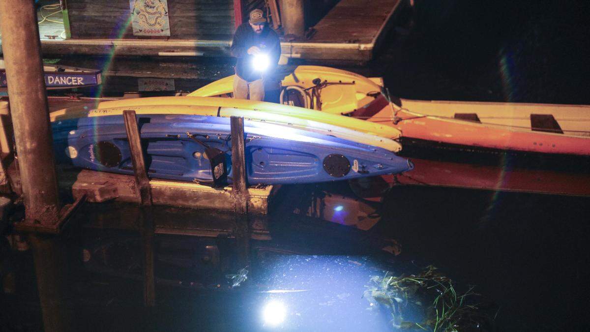 D.J. Hardy checks the current flow as he is on watch with other boat owners about 1:10 AM in Morro Bay. A tsunami advisory was issued for San Luis Obispo County beaches following an 8.7 earthquake in Russia. He is seen here on July 30, 2025.