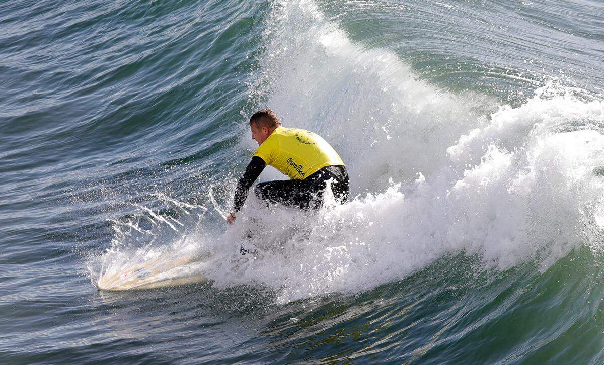 David Lewis, from England, competes in the first heat for the visually impaired competition. The 2022 Pismo Beach ISA World Para Surfing Championships is hosted by AmpSurf.
