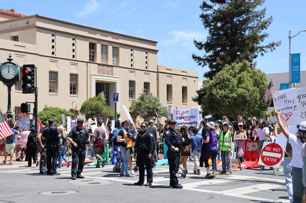 Thousands gathered in San Luis Obispo, California, for No Kings Day to protest executive overreach by the Trump administration on the President’s birthday. Police calmly patrolled the streets to make sure marchers stayed on the sidewalks and closed off areas.