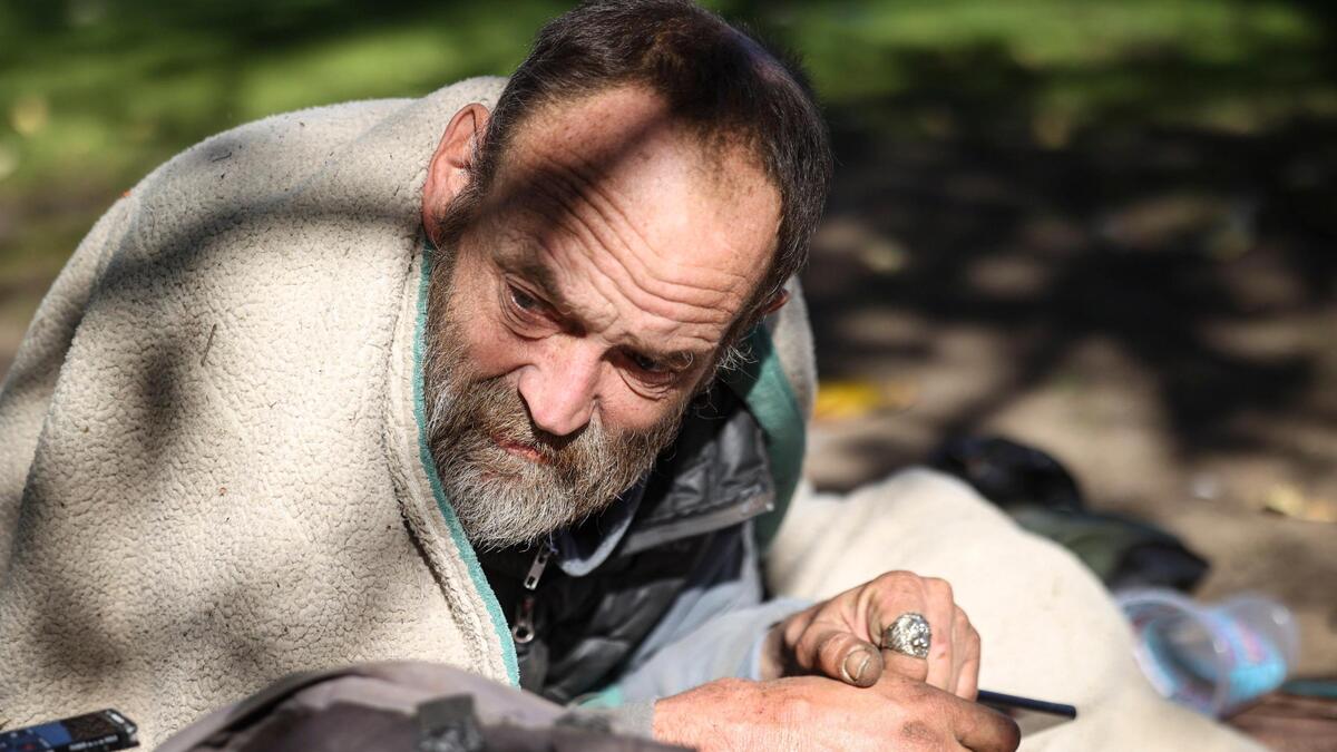 Mike Gibson spends time in the sun at Santa Rosa Park in San Luis Obispo on Jan. 10, 2025.