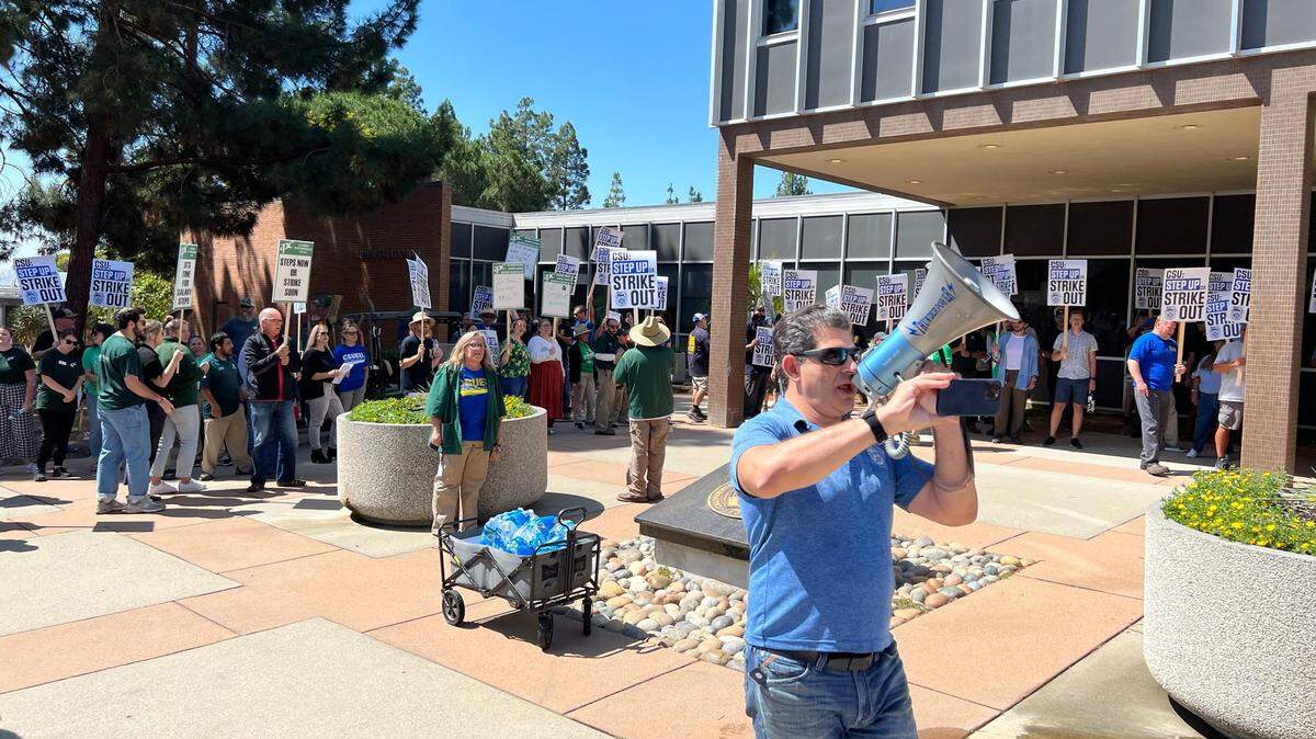 Maintenance workers from Teamsters Local 2010 stage a picket outside of the Cal Poly Administration Building on Sept. 14, 2022. They have voted to go on strike on Nov. 14 after failing to reach an agreement with the CSU.