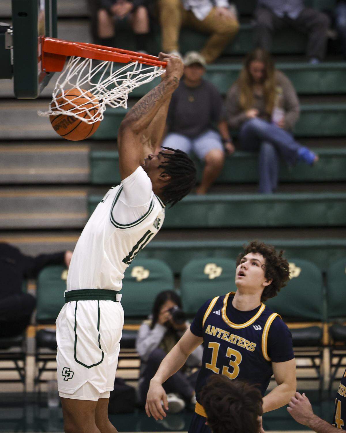 Austin Goode dunks early in the first half. Cal Poly men scored an upset basketball victory over U.C. Irvine 79-73 on Feb. 12, 2026.