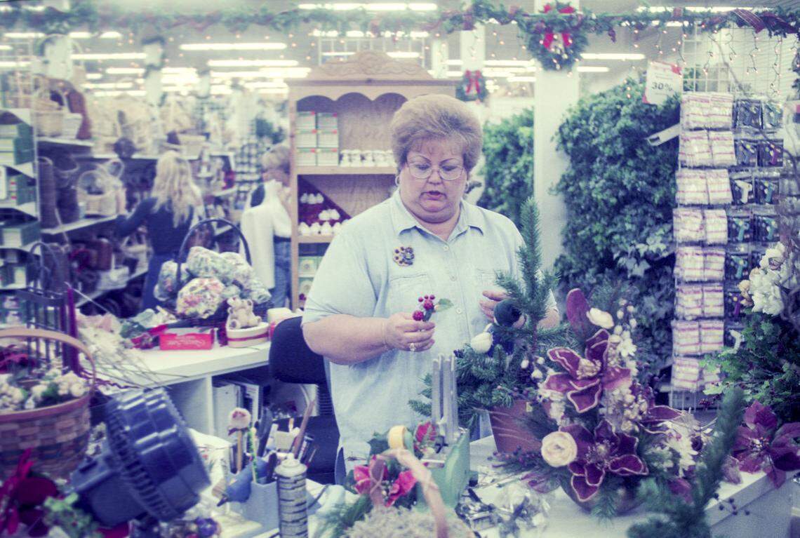 Employee Peggy Lee Robertson works on a centerpiece at Beverly's in Downtown San Luis Obispo on Nov. 25, 1998.