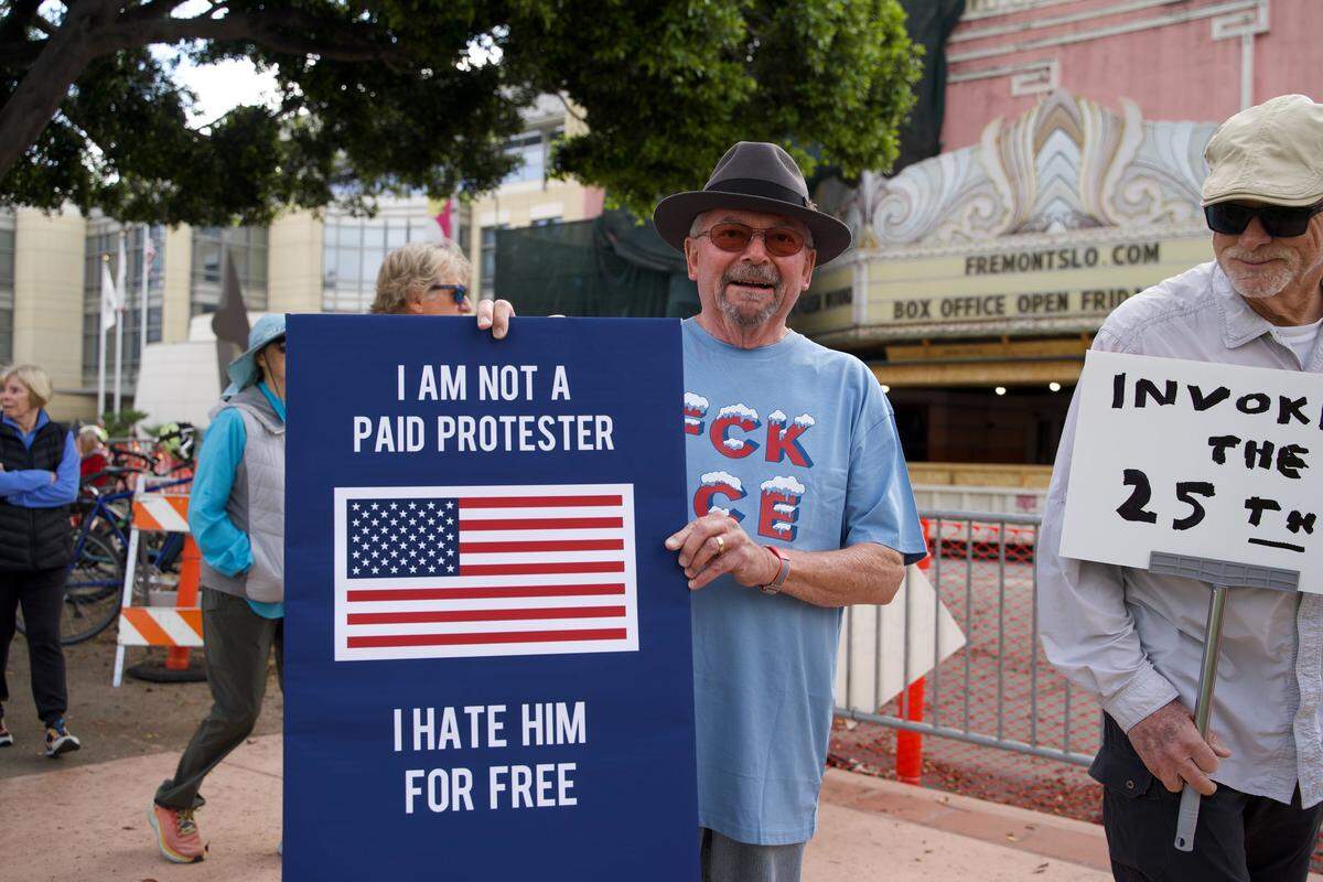 Residents across SLO County rallied downtown at the San Luis Obispo Superior Courthouse for a No Kings protest featuring speakers, music and community groups on March 28, 2026. Paso Robles resident Bill Miller speaks to the crowd.